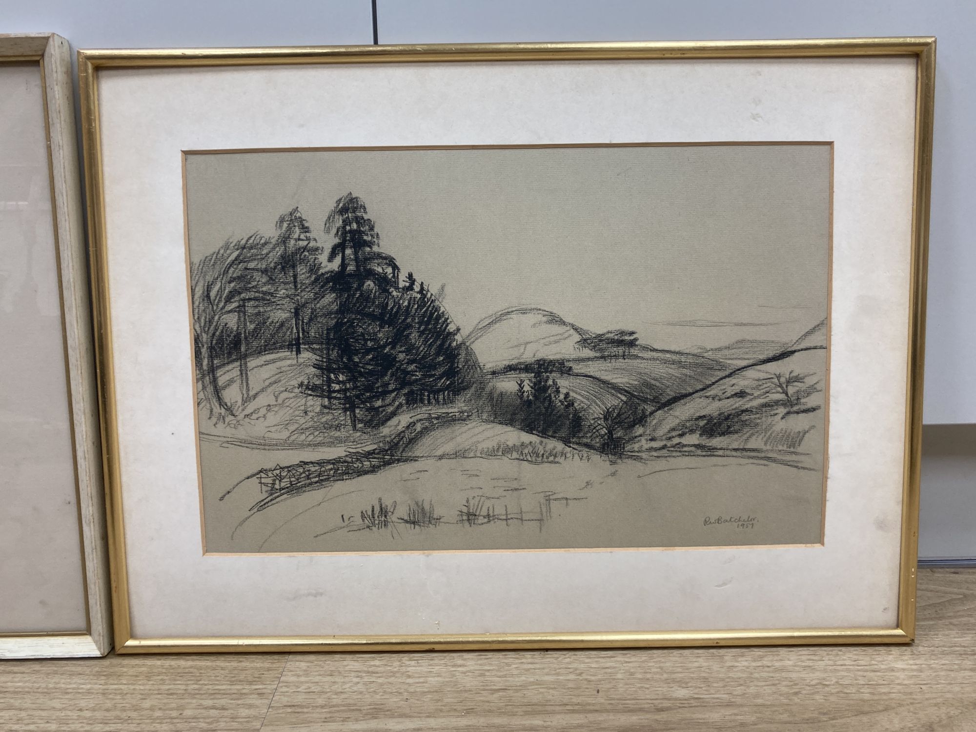R.W. Batcheler, charcoal sketch, Mountain landscape, signed and dated 1957, 28 x 44cm and a pastel, Springtime on the windrush by A.